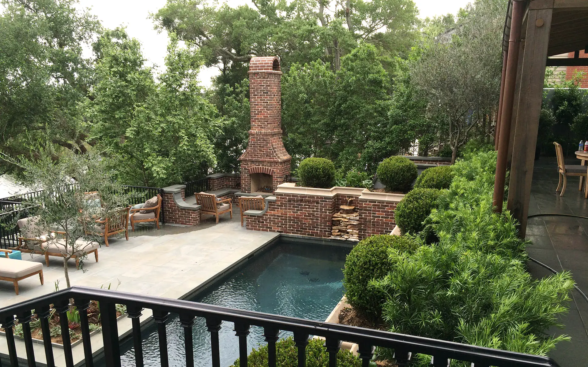 pool fountain and outdoor kitchen